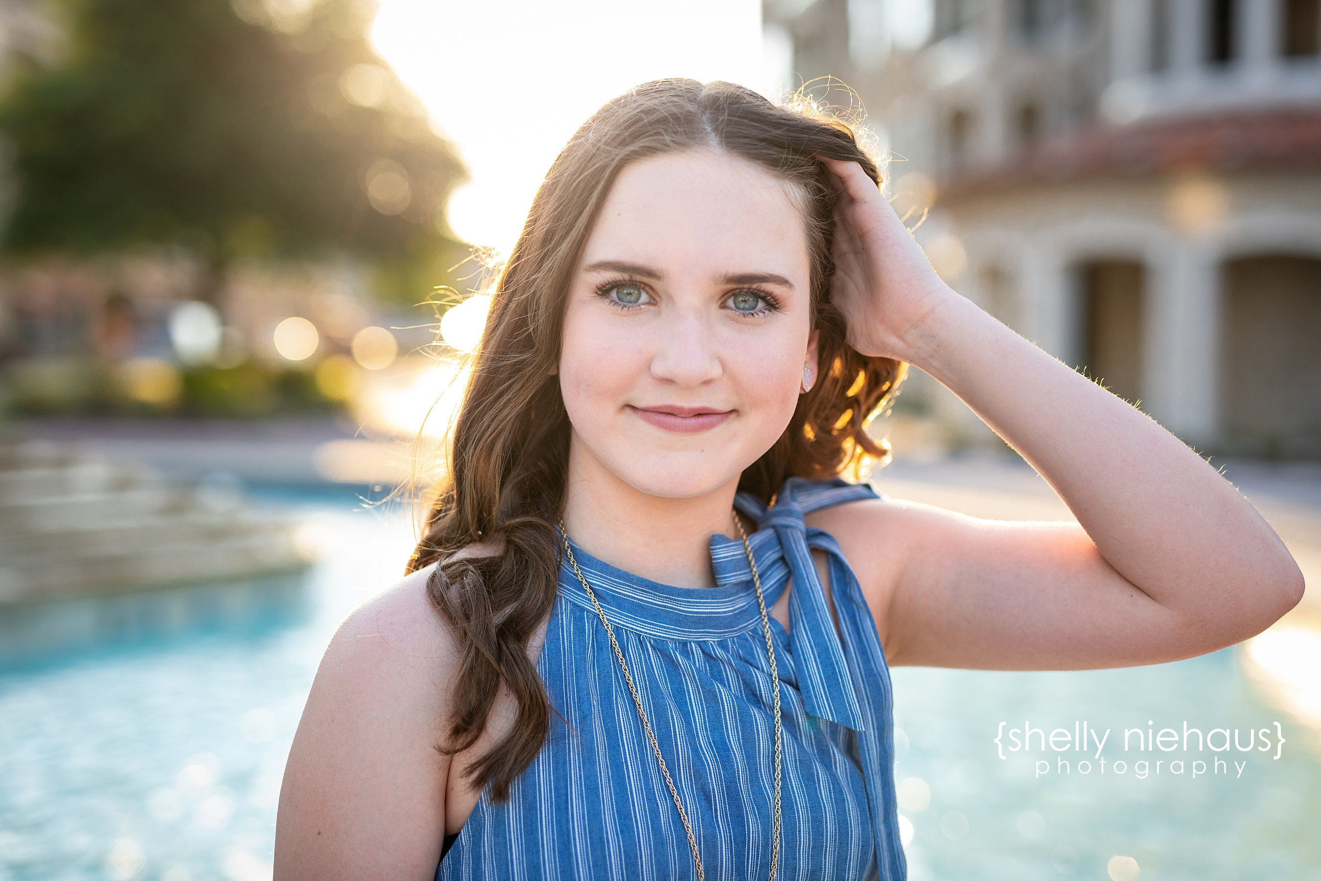 Teen portrait session in Adriatica in McKinney Texas with 13-year-old girl in a blue romper.